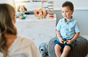 Young boy attending individual aba therapy.
